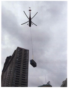 HELICOPTER LIFT FOR A
MAKE-UP AIR UNIT ON A 
DOWNTOWN HIGH-RISE