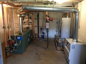ALL NEW EQUIPMENT...
HEATING BOILER, DOMESTIC HOT WATER BOILER AND STORAGE TANKS